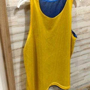 Men's gold tank top.   Box 149